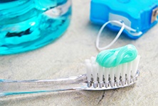 Toothpaste, toothbrush, and floss for preventing dental emergencies in Greensboro