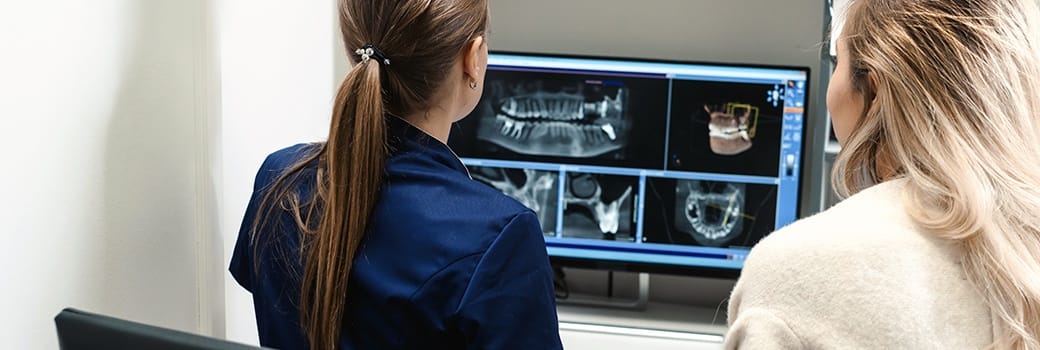 woman looking at digital x-ray