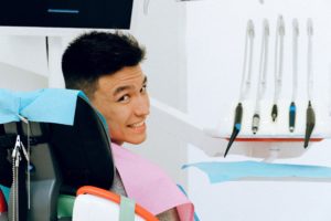 Smiling man in dental chair